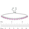Thumbnail Image 1 of Oval Lab-Created Pink Sapphire and 0.086 CT. T.W. Diamond Frame Bolo Bracelet in Sterling Silver - 9.5"