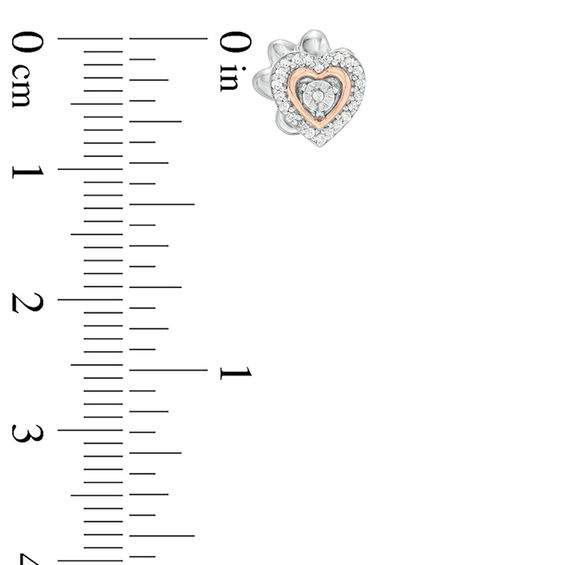 0.085 CT. T.W. Diamond Reversible Heart and Paw Print Stud Earrings in Sterling Silver and 10K Rose Gold