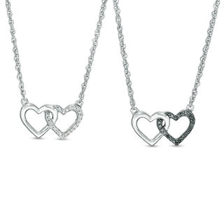 0.115 CT. T.W. Enhanced Black and White Diamond Reversible Interlocking Hearts Necklace in Sterling Silver - 17.37"