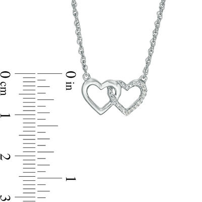 0.115 CT. T.W. Enhanced Black and White Diamond Reversible Interlocking Hearts Necklace in Sterling Silver - 17.37"