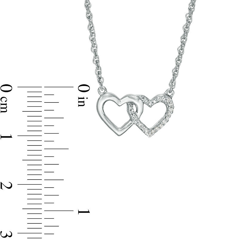0.115 CT. T.W. Enhanced Black and White Diamond Reversible Interlocking Hearts Necklace in Sterling Silver - 17.37"|Peoples Jewellers