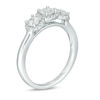 0.95 CT. T.W. Certified Canadian Diamond Frame Three Stone Engagement Ring in 14K White Gold (I/I1)