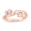 Thumbnail Image 0 of 0.23 CT. T.W. Diamond Bezel-Set Wave Crossover Ring in 10K Rose Gold