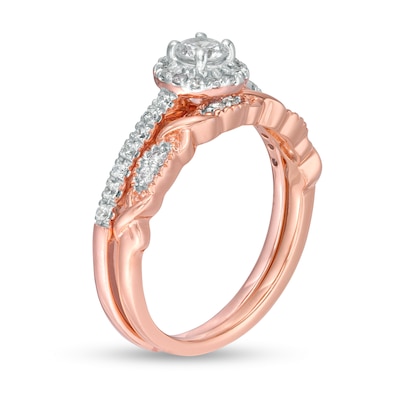 0.58 CT. T.W. Diamond Frame Twist Shank Bridal Set in 10K Rose Gold