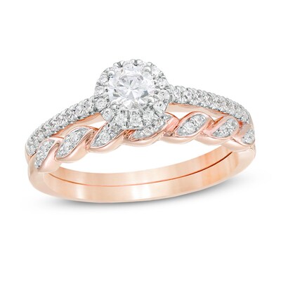 0.45 CT. T.W. Diamond Frame Twist Shank Bridal Set in 10K Rose Gold