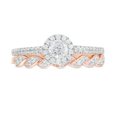 0.45 CT. T.W. Diamond Frame Twist Shank Bridal Set in 10K Rose Gold