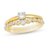 Thumbnail Image 0 of 0.29 CT. T.W. Diamond Ribbon Bridal Set in 10K Gold