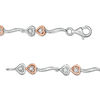 Thumbnail Image 1 of 0.087 CT. T.W. Diamond Double Heart Wave Bracelet in Sterling Silver and 10K Rose Gold - 7.5"