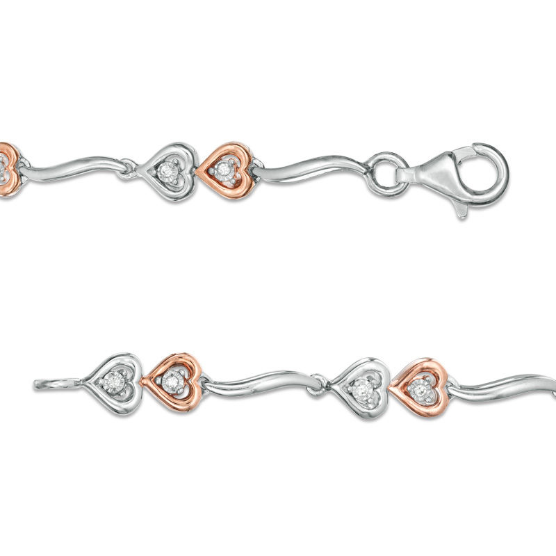 0.087 CT. T.W. Diamond Double Heart Wave Bracelet in Sterling Silver and 10K Rose Gold - 7.5"