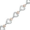 0.23 CT. T.W. Diamond Alternating Sideways Heart Bracelet in Sterling Silver and 10K Rose Gold - 7.5"