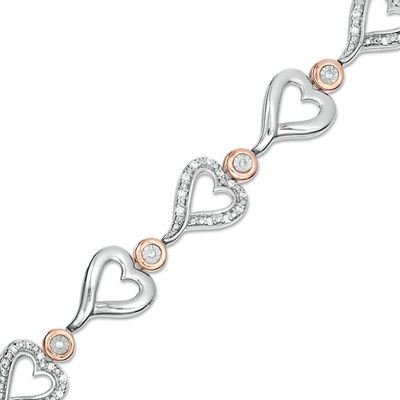 0.23 CT. T.W. Diamond Alternating Sideways Heart Bracelet in Sterling Silver and 10K Rose Gold - 7.5"