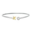 0.04 CT. T.W. Diamond "XO" Open Flex Bangle in Sterling Silver and 10K Gold