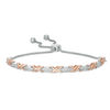 Thumbnail Image 0 of 0.068 CT. T.W. Diamond Layered "XO" Bolo Bracelet in Sterling Silver and 10K Rose Gold - 9.5"