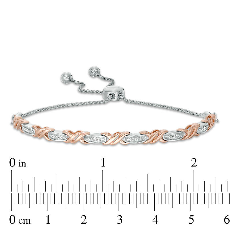 0.068 CT. T.W. Diamond Layered "XO" Bolo Bracelet in Sterling Silver and 10K Rose Gold - 9.5"|Peoples Jewellers