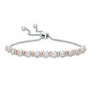Thumbnail Image 0 of 0.085 CT. T.W. Diamond Alternating Vertical Bar Bolo Bracelet in Sterling Silver and 10K Rose Gold - 9.5"