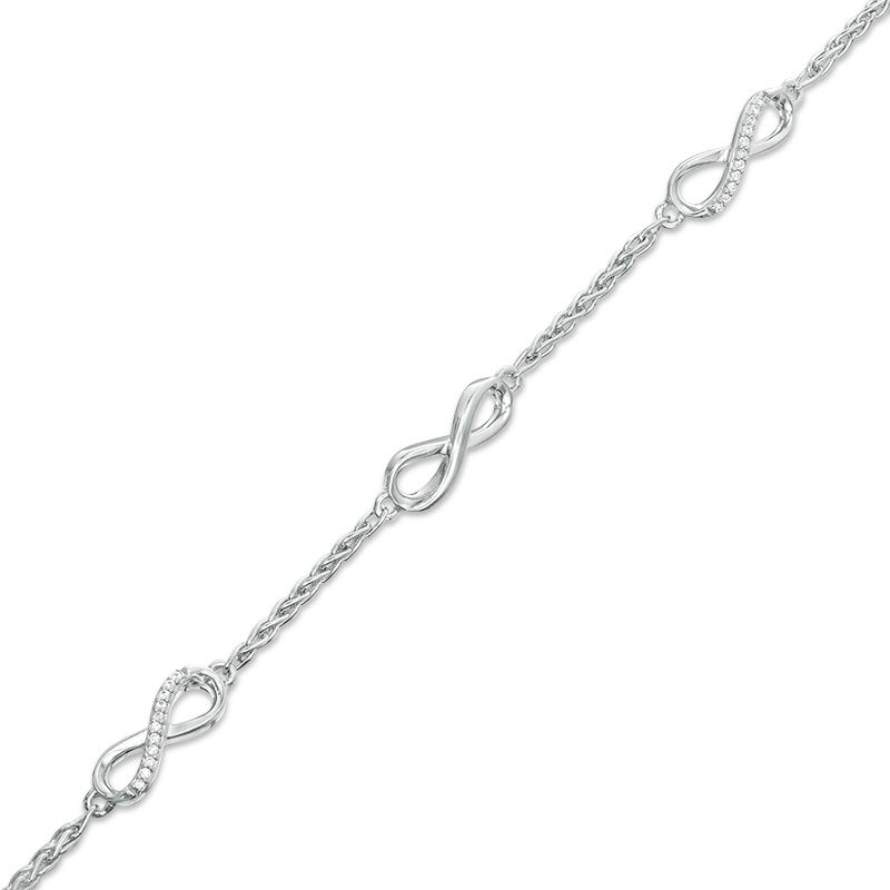 0.145 CT. T.W. Diamond Infinity Station Bracelet in Sterling Silver - 7.25"
