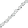 0.45 CT. T.W. Baguette and Round Diamond Infinity Bracelet in Sterling Silver - 7.25"