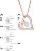 Thumbnail Image 2 of 0.065 CT. T.W. Diamond Flower and Heart Outline Pendant in 10K Rose Gold