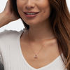 0.085 CT. T.W. Diamond Tilted Layered Double Heart Pendant in 10K Rose Gold