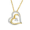 0.085 CT. T.W. Diamond Tilted Layered Double Heart Pendant in 10K Gold