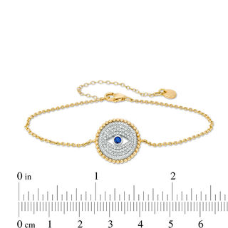 2.5mm Lab-Created Ceylon Sapphire and 0.19 CT. T.W. Diamond Evil Eye Bracelet in Sterling Silver and 10K Gold - 8.5"