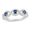 3.0mm Blue Sapphire and 0.15 CT. T.W. Diamond Three Stone Twist Shank Stackable Band in 10K White Gold