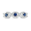 3.0mm Blue Sapphire and 0.15 CT. T.W. Diamond Three Stone Twist Shank Stackable Band in 10K White Gold