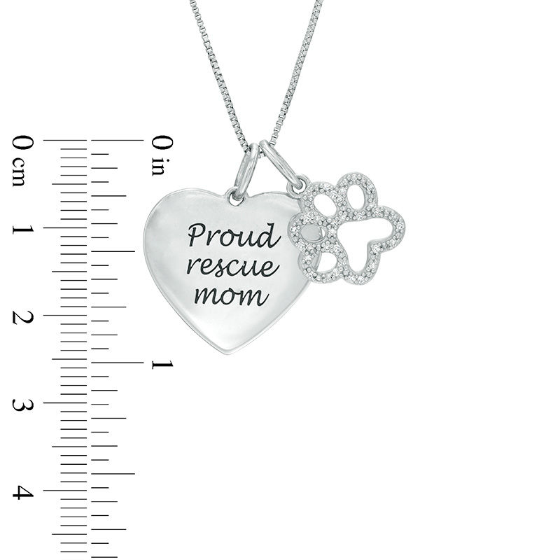 0.10 CT. T.W. Diamond Paw Print Outline and "Proud rescue mom" Heart Charm Pendant in Sterling Silver