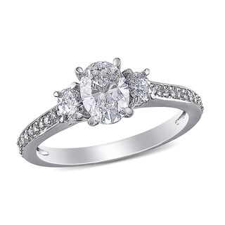 1.10 CT. T.W. Oval Diamond Three Stone Engagement Ring in 14K White Gold