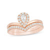 0.50 CT. T.W. Pear-Shaped Diamond Frame Chevron Bridal Set in 14K Rose Gold