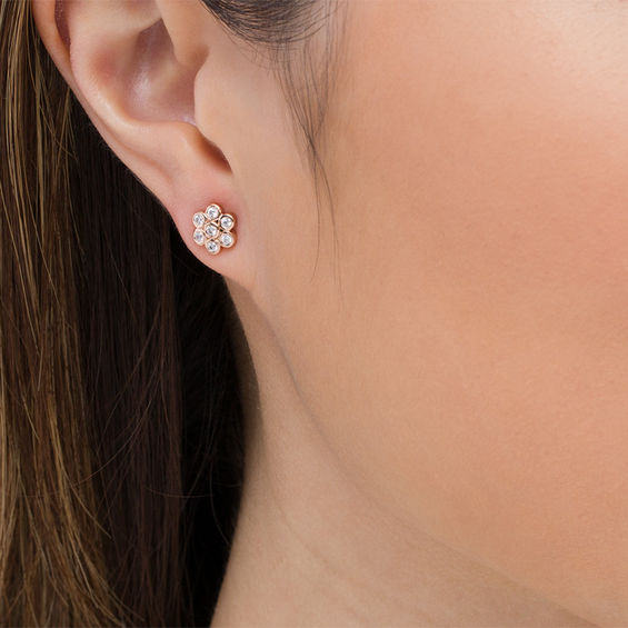 0.18 CT. T.W. Diamond Bezel-Set Flower Stud Earrings in 10K Rose Gold