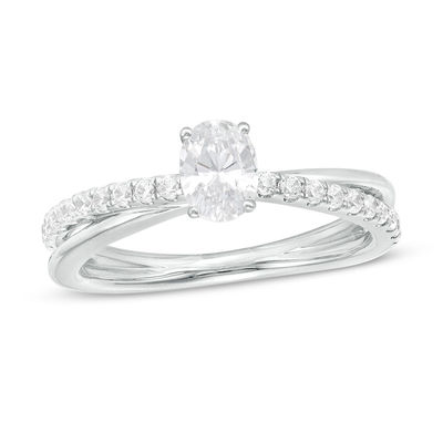 0.70 CT. T.W. Oval Diamond Crossover Engagement Ring in 14K White Gold