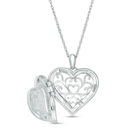 0.067 CT. T.W. Diamond Heart with Outline Locket in Sterling Silver