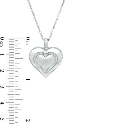 0.067 CT. T.W. Diamond Heart with Outline Locket in Sterling Silver