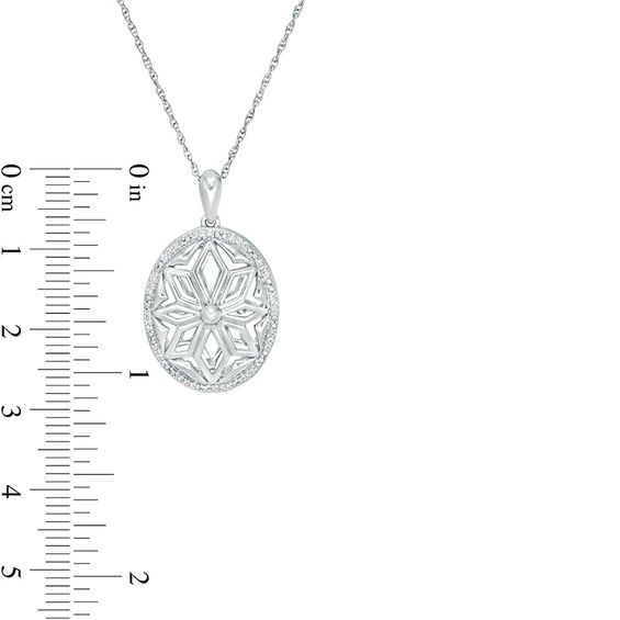 0.118 CT. T.W. Diamond Oval Flower Locket in Sterling Silver