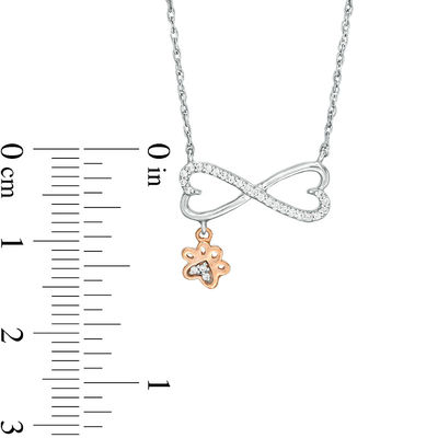 0.067 CT. T.W. Diamond Sideways Heart Infinity with Paw Print Dangle Necklace in Sterling Silver and 10K Rose Gold