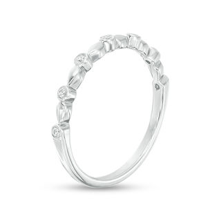 0.09 CT. T.W. Diamond Bezel Set Wedding Band in Platinum