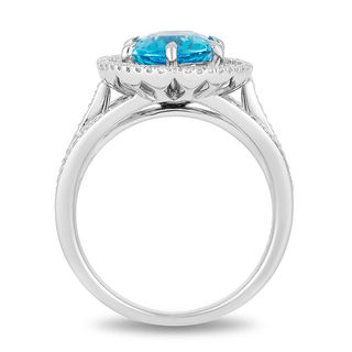 Enchanted Disney Aladdin Oval Swiss Blue Topaz and 0.23 CT. T.W. Diamond Frame Split Shank Ring in Sterling Silver