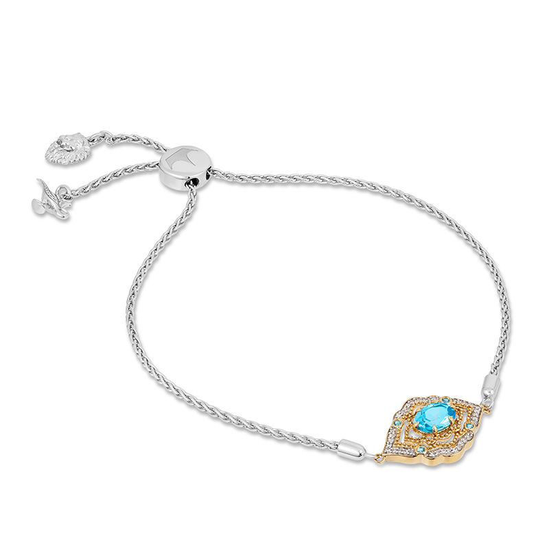 Enchanted Disney Aladdin Oval Swiss Blue Topaz and 0.065 CT. T.W. Diamond Bolo Bracelet in Sterling Silver and 10K Gold|Peoples Jewellers