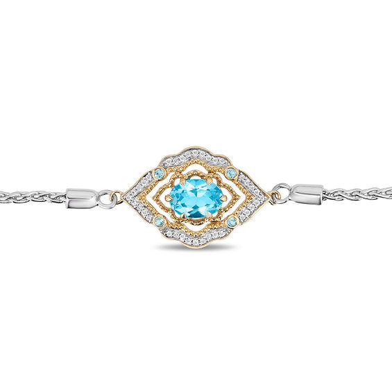 Enchanted Disney Aladdin Oval Swiss Blue Topaz and 0.065 CT. T.W. Diamond Bolo Bracelet in Sterling Silver and 10K Gold