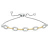 Thumbnail Image 0 of 0.29 CT. T.W. Diamond Oval Link Bolo Bracelet in Sterling Silver and 10K Gold - 9.5"