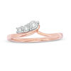 0.04 CT. T.W. Diamond Three Stone Sweep Bypass Ring in 10K Rose Gold