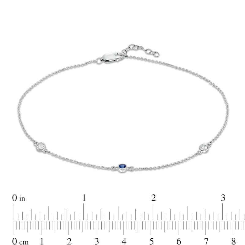 Bezel-Set Lab-Created Blue Sapphire Three Stone Station Anklet in Sterling Silver