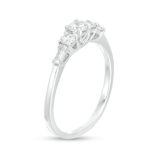 0.29 CT. T.W. Diamond Three Stone Engagement Ring in 10K Gold