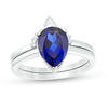 Pear-Shaped Lab-Created Blue Sapphire, White Topaz and 0.04 CT. T.W. Diamond Crown Bridal Set in 10K White Gold