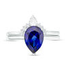 Pear-Shaped Lab-Created Blue Sapphire, White Topaz and 0.04 CT. T.W. Diamond Crown Bridal Set in 10K White Gold