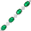 Thumbnail Image 0 of Oval Lab-Created Emerald and White Sapphire Cluster Line Bracelet in Sterling Silver - 7.25"