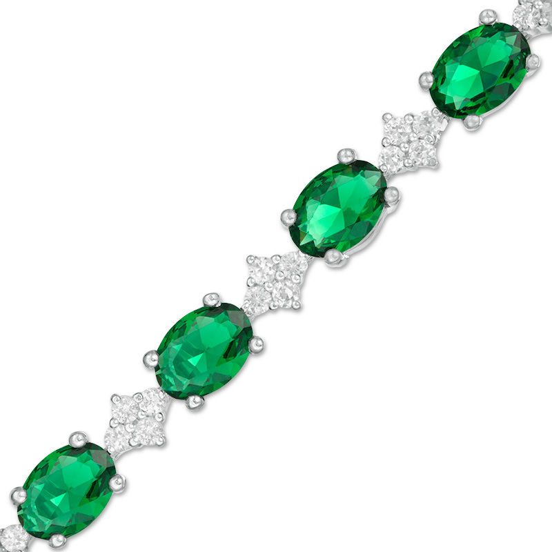 Oval Lab-Created Emerald and White Sapphire Cluster Line Bracelet in Sterling Silver - 7.25"|Peoples Jewellers