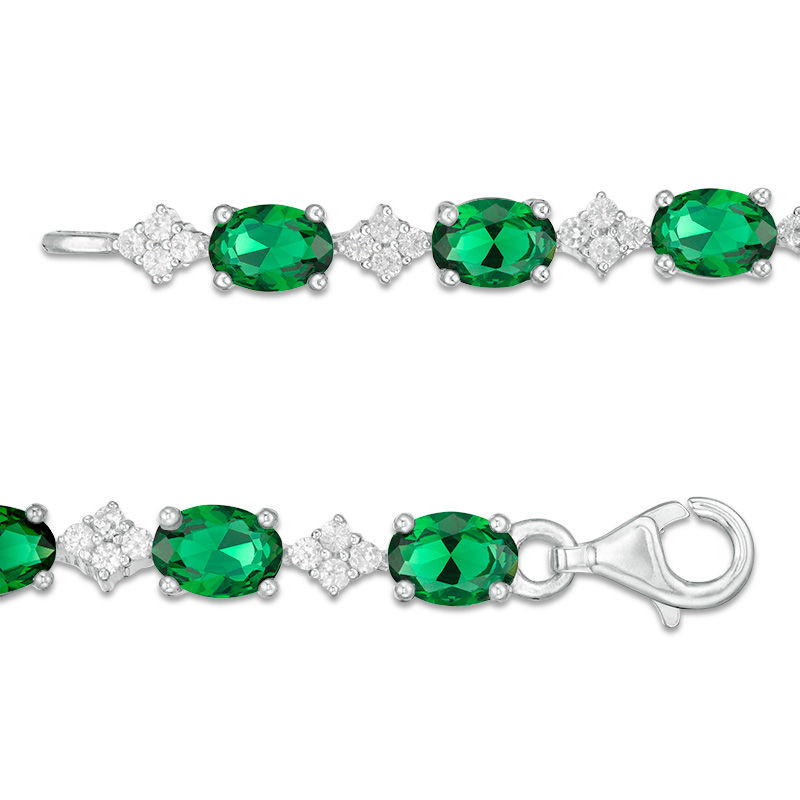 Oval Lab-Created Emerald and White Sapphire Cluster Line Bracelet in Sterling Silver - 7.25"|Peoples Jewellers
