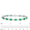 Thumbnail Image 3 of Oval Lab-Created Emerald and White Sapphire Cluster Line Bracelet in Sterling Silver - 7.25"